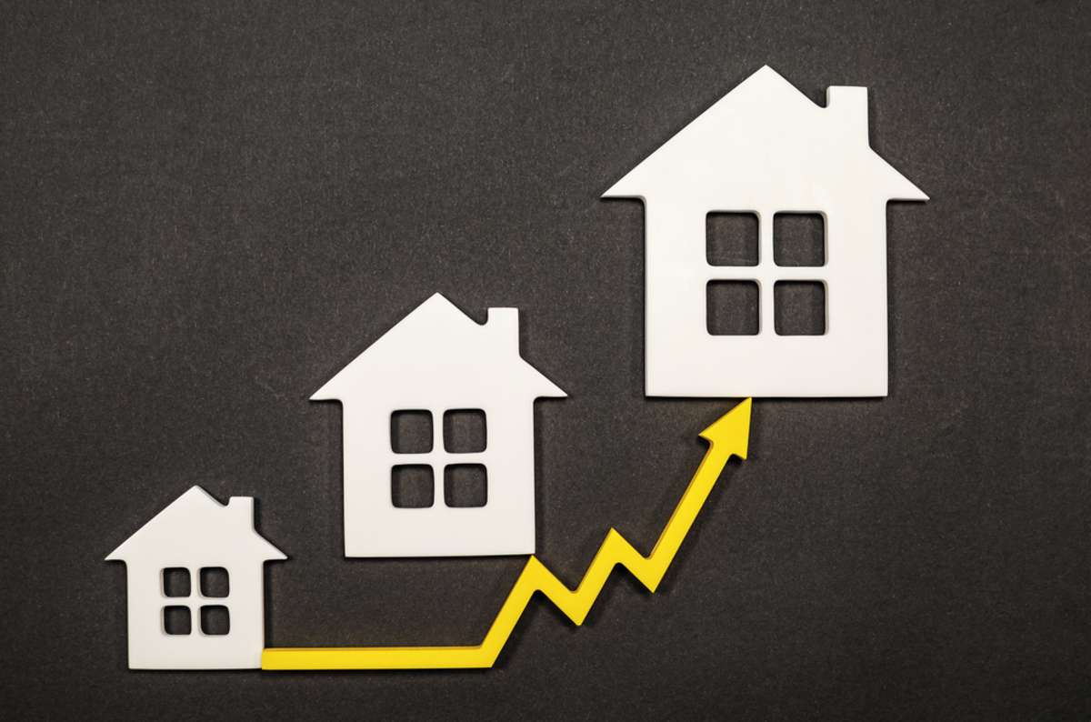 Real estate sales growth concept, housing value increase